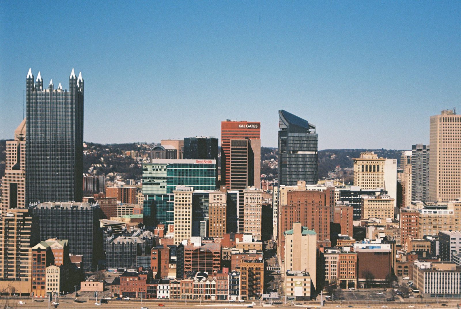 The Pittsburgh skyline with the glass spires of PPG Place against a clear sky