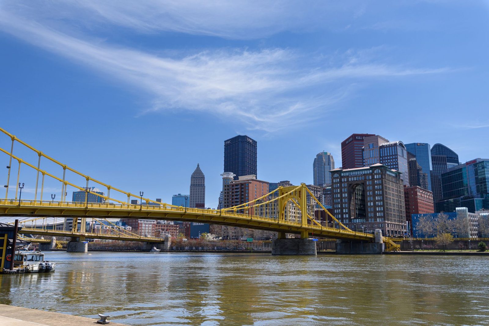 One of Pittsburgh's yellow bridges over the Allegheny River, with downtown behind it
